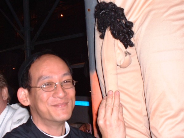 D_penis_bodysuit_and_priest.jpg